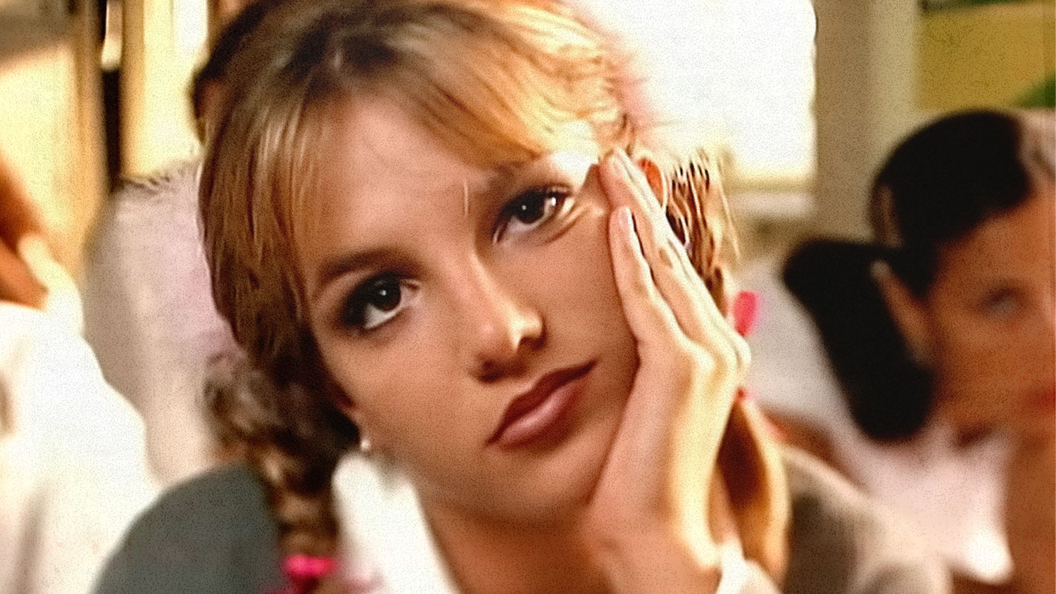A girl poses in music video.